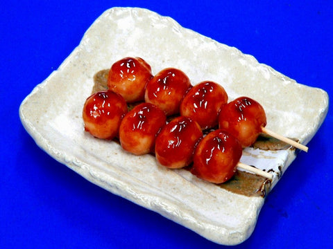 Toasted Dumplings Covered in a Soy & Sugar Sauce Replica
