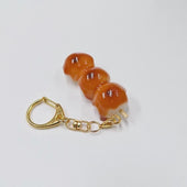 Toasted Dumplings Covered in a Soy & Sugar Sauce (3-piece with Skewer) Keychain - Fake Food Japan
