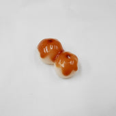 Toasted Dumplings Covered in a Soy & Sugar Sauce Magnet - Fake Food Japan